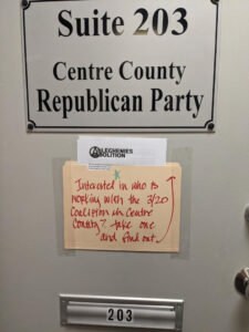 Picture of door of Centre County Republican Party with manila folder taped to door 